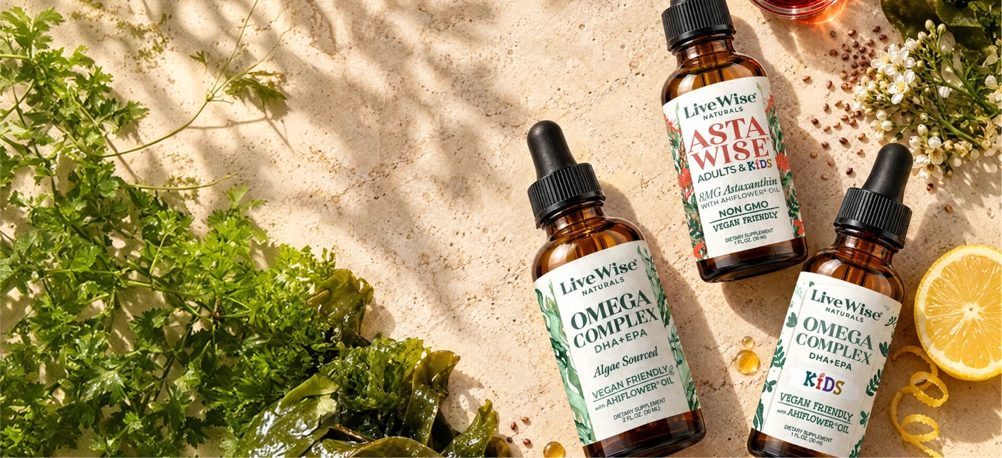 Adult Omega, Kids Omega and Asta Wise bottles with algae and lemon